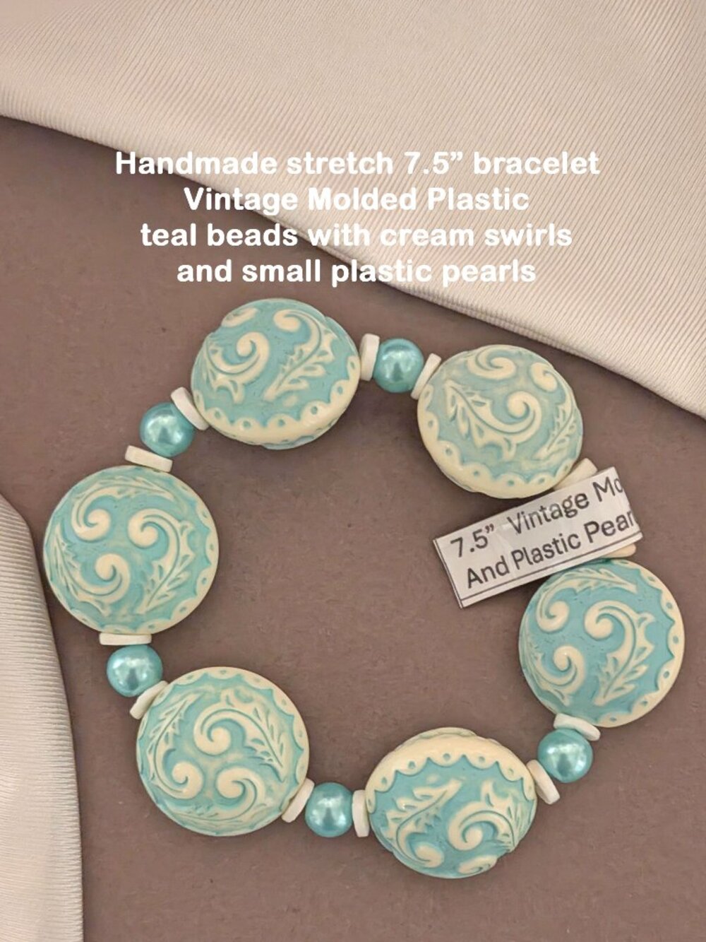 Handmade stretch 7.5" bracelet Vintage Molded Plastic teal beads w/ cream swirls
